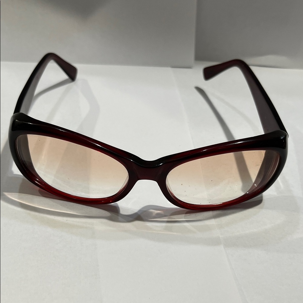 Oliver Peoples Elegant Red eyeglasses.